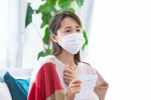 感染症で具合が悪いママ